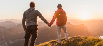 Couple holding hands