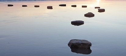 rolls of rocks in the lake