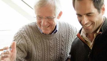 Men reviewing financial plan