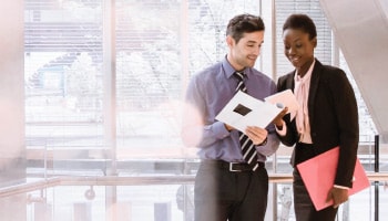 Man and woman working in office